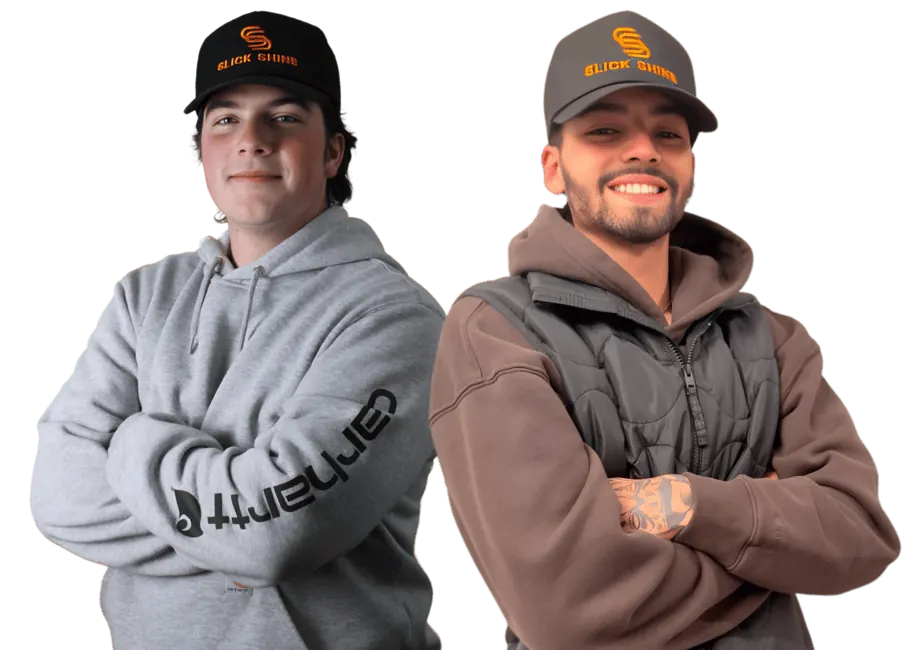 Slick Shine co-owners Chris Maag and Ricky Adams Jr. in Slick Shine hats and hoodies