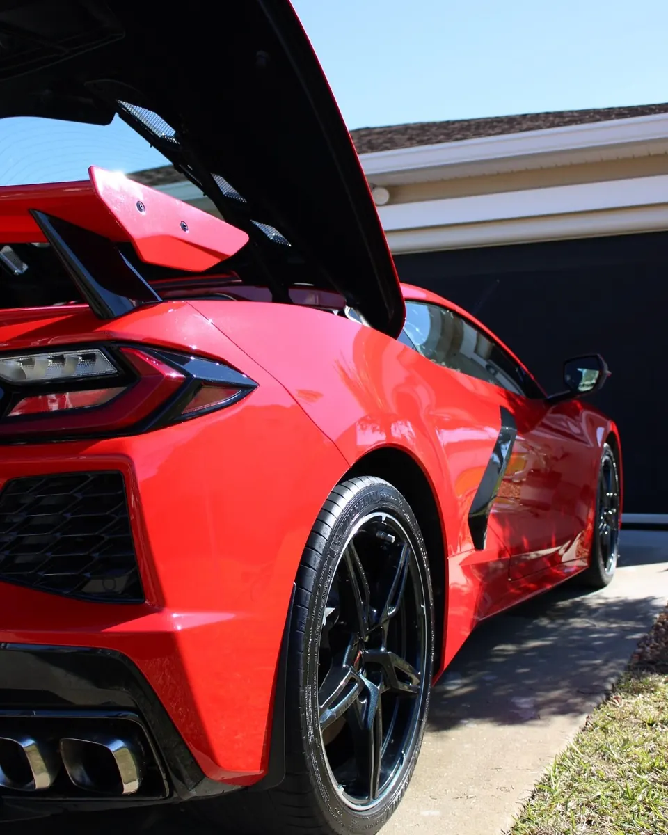 Red C8 Corvette after a VIP maintenance detail