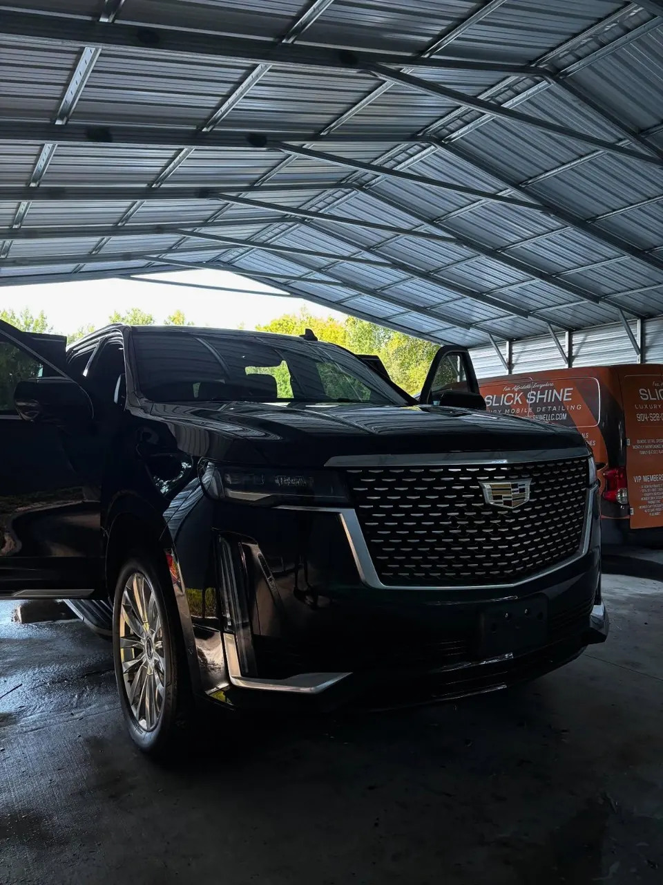 Black Cadillac Escalade from a Jacksonville black-car fleet after detailing