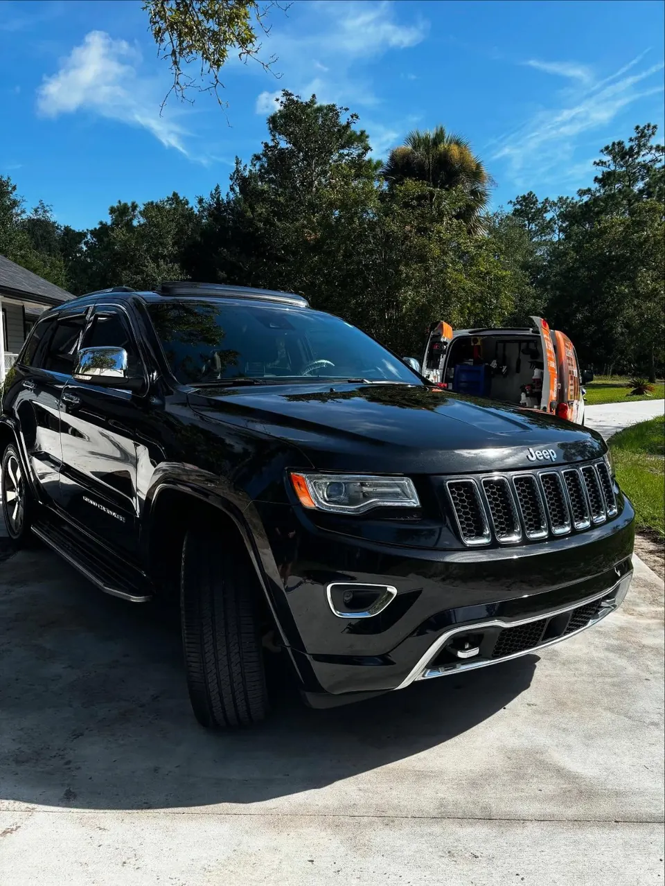 Black Jeep Grand Cherokee after a deep interior and exterior detail